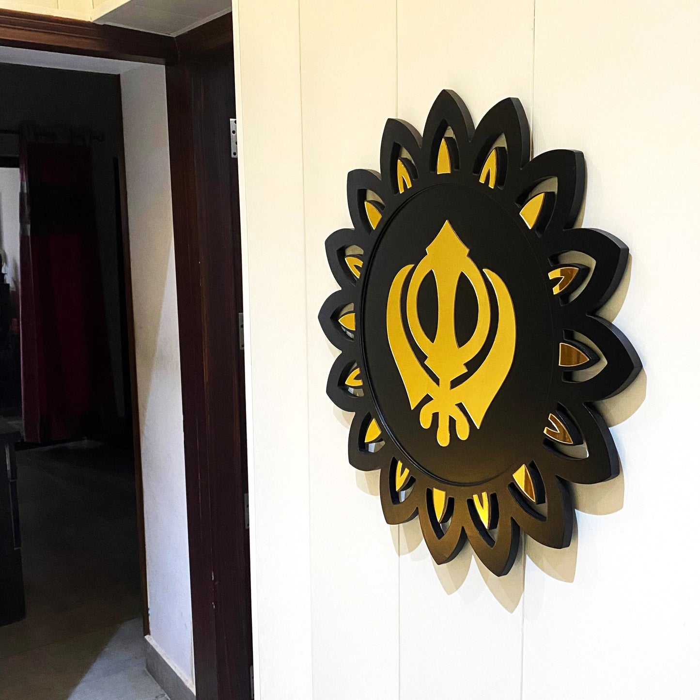 Khanda - Black & Golden Flower Shape Wall Hanging